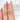 14kt gold stacking ring with diamond halo design and intricate details