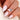 180ct oval peach champagne sapphire ring with 14kt gold cluster design