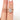Luxurious 14kt rose gold bridal set with a 203ct peach champagne sapphire and diamond accents