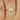 Beautifully crafted 14kt gold pear rose cut Forever One Moissanite bezel solitaire ring by Pandora, featuring a stunning 8x5mm stone