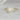 Pandora 8x5mm 14kt Gold Pear Rose Cut Forever One Moissanite Bezel Solitaire Ring on a woman's hand with elegant and timeless design