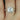 Beautiful 14kt white gold engagement ring featuring 75mm cushion moissanite and diamond halo
