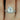 Alt text: Shimmering 3ct Darcy 10x8mm & Ember 14kt Gold Moissanite and Diamond Oval Solitaire with AccentsBridal Set sparkling in the light