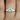 Francis 8mm 14kt Yellow Gold Round Moissanite and Diamond Baguette Engagement Ring with stunning sparkle and timeless design