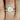 Close-up of Skinny Denise 8mm & Tiffani 14kt White Gold Asscher Moissanite and Diamonds Tulip Cathedral Solitaire Bridal Set with intricate diamond details and elegant design