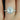 Close-up image of a stunning Ready to Ship Federella 9x7mm Platinum Oval Forever One Moissanite Diamond Halo Engagement Ring with intricate details and sparkling gemstones