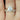2ct Dakota 9x7mm Cher & Tabitha 14kt Rose Gold Moissanite Diamond TRIO Bridal Set showcasing a stunning 2 carat Dakota moissanite center stone in a 9x7mm size, elegantly set in a 14kt rose gold band with two matching Cher & Tabitha moissanite diamond bands