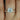 Skinny Flora 8mm & Christie 14kt Rose Gold Round Moissanite and Diamonds Bridal Set showcasing elegant and stylish wedding rings with shimmering stones