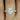 Tabitha 10x7mm 14kt Rose Gold Pear Moissanite and Diamonds Halo Classic Bridal Set, stunningly crafted with 14kt rose gold and adorned with sparkling moissanite and diamonds in a classic halo design