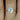 Close-up image of Celeste 8x6mm 14kt Rose Gold Oval Moissanite and Diamonds Pave Halo Engagement Ring showcasing the sparkling gemstone and intricate diamond encrusted band design