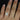A hand wearing the beautiful Mosaic Grande 14kt Rose Gold WITH Milgrain Diamonds Cluster Ring, showcasing its elegant design and luxurious appearance