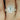 Avery 10x8mm 14kt Rose Gold Oval Moissanite and Diamond Split Shank Cushion Halo Bridal Set ring on woman's finger