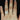 Close-up of 14kt Rose Gold Oval Moissanite and Diamond Split Shank Cushion Halo Bridal Set