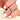 Close-up of 14kt Gold Cici 55mm Cigar Nesting Ring for women