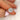 Handcrafted 14kt rose gold moissanite cushion halo ring by rosados box, a custom design with four prongs.