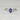  Close-up of the 7x5mm blue sapphire oval solitaire stone on the Ready to Ship Ciara ring