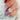 east west set emerald cut ring on ring finger