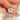 east west set emerald cut ring on finger