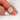  Hand model wearing 2ct Chantelle 9x7mm 14kt Moissanite Diamond Non-Cathedral Halo Ring