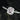 Shimmering platinum engagement ring featuring 7x5mm morganite and diamond cushion halo