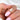 Close-up image of the Ready to Ship Arya 10x5mm 14kt Yellow Gold Forever One GH Moissanite Diamond Dainty Solitaire Marquise Engagement Ring, showcasing its elegant design and high-quality materials