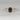 Exquisite 14kt rose gold engagement ring featuring a 138cts teal blue sapphire and dazzling diamonds in an emerald halo setting