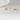 Close-up image of Ultra Petite Leona 14kt Rose Gold Marquise Diamond Floating Single Prong HALFWAY Eternity Band Ring on a woman's finger, showcasing its delicate and elegant design