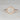 Close-up of Willis 7mm 14kt Rose Gold Round Moissanite Diamonds Hexagon Halo WITH Milgrain Engagement Ring on woman's finger
