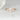 075ct Greta 7x5mm 14kt Gold Moissanite Pear Three Stone Ring, a stunning and elegant jewelry piece perfect for any occasion