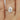 Side view of Delia 9x7mm 14kt Rose Gold Oval Moissanite Ring