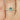  Top angle view of 14kt yellow gold oval jungle teal sapphire diamond halo engagement ring