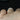  Close-up of 141cts oval peach champagne sapphire and diamond halo bridal set