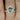 268ct Eluma bi-color mint teal sapphire diamond bridal set in 14kt gold, featuring a shield design with graduated halo detailing