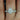 Tabitha 8x5mm 14kt White Gold Pear Moissanite and Diamonds Halo Classic Bridal Set ring displayed on a white background