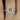 Elegant and romantic engagement ring with intricate leaf and milgrain details