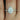 Tabitha 8x5mm 14kt White Gold Pear Moissanite and Diamonds Halo Engagement Ring with elegant design and stunning gemstone details
