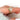 Unique Oval Cut Wedding Ring set on woman's finger on white background