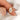 moval diamond ring with button back and knife edge shank on finger