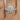  Reversed tapered channel engagement ring with 14kt oval flower petal halo