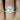Katherine 10x8mm 14kt White Gold Oval Moissanite and Diamond Flower Petal Halo Classic Bridal Set, featuring a stunning oval moissanite center stone with a diamond-encrusted flower petal halo design