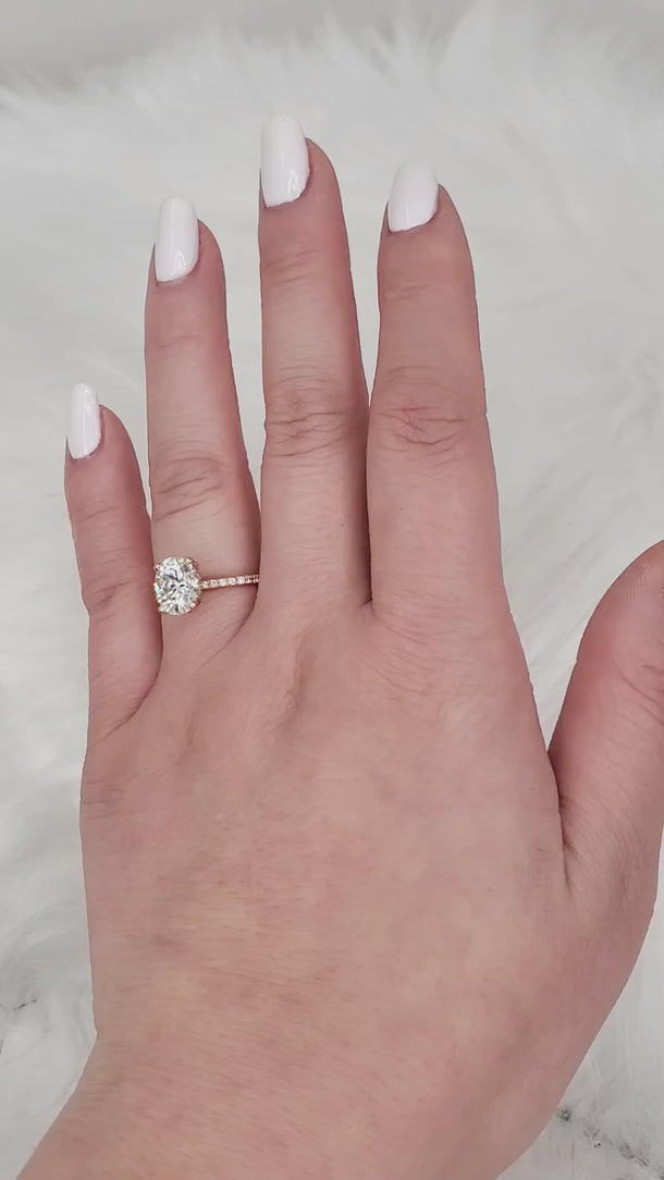 oval solitaire with accents on hand video