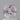 122 carat oval cut faint white pink sapphire gemstone on display